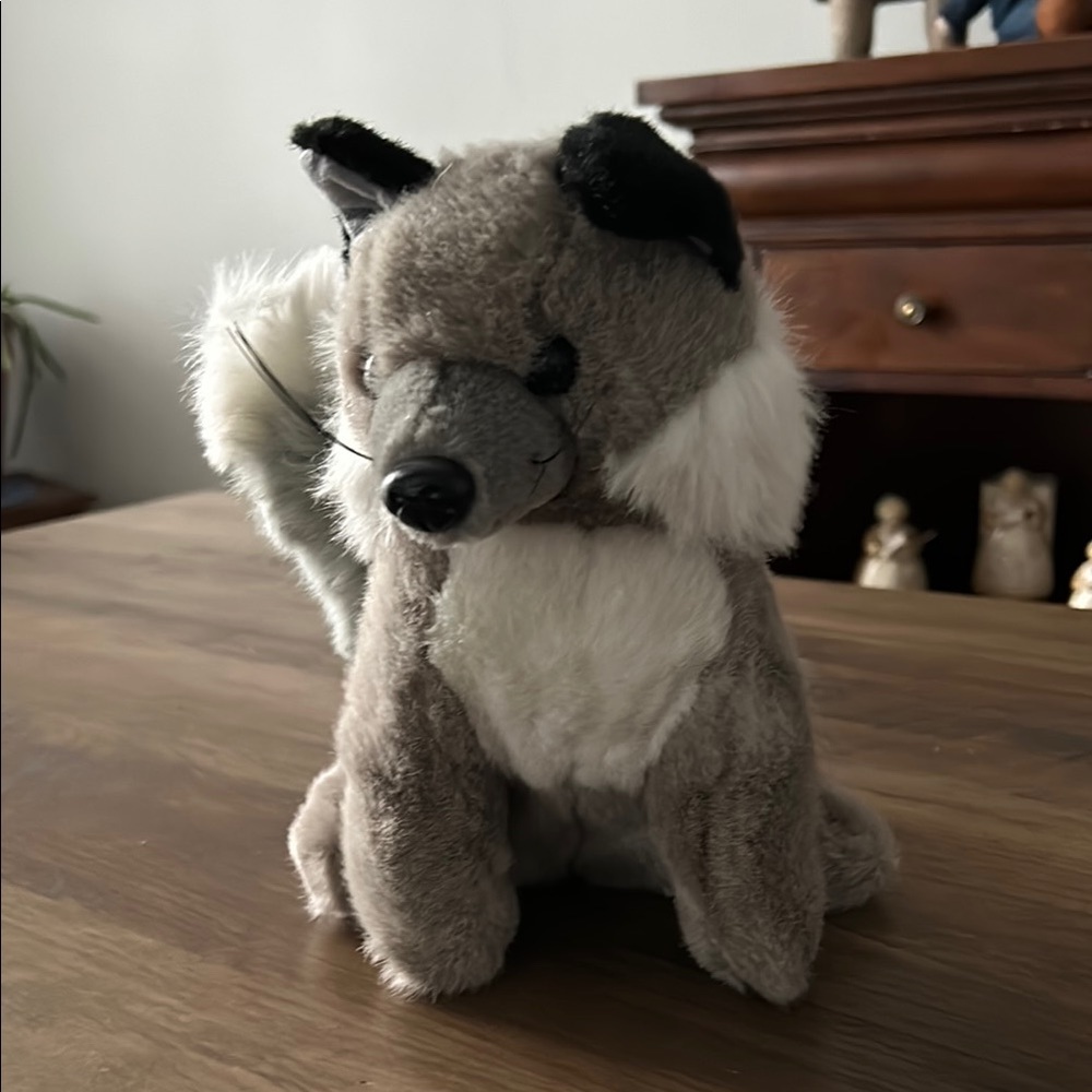 Cute Plush Fox Husky Dog with a long pointy nose.